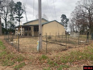 Great buy on a 2,000 sq ft home (3 bdrm/2 bath) fronting scenic