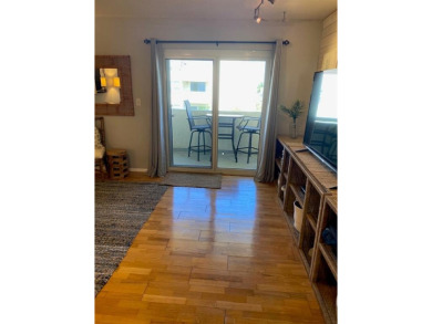 BOAT DOCK available for rent. TOP FLOOR 2 bed 2 bath corner unit