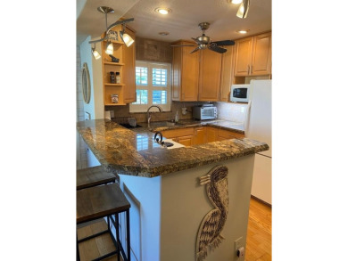 BOAT DOCK available for rent. TOP FLOOR 2 bed 2 bath corner unit