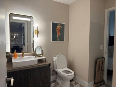 Best Priced 2 bdrm/2 bath Lower Penthouse Unit with Upgraded