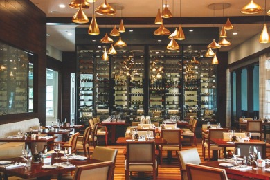 This stunning waterfront British West Indies-style home offers 5