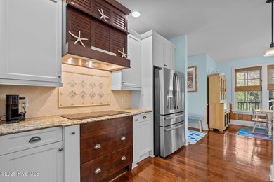 This exceptional 5+ bedroom coastal retreat in the sought-after