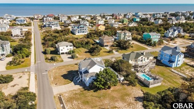 This home, located in Whalehead features a versatile layout