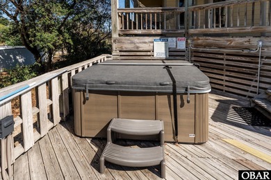 This home, located in Whalehead features a versatile layout