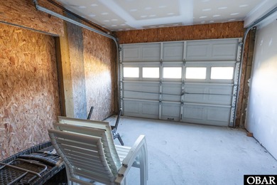 This home, located in Whalehead features a versatile layout