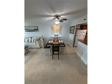 Beautifully updated and move-in ready, this active 55+community