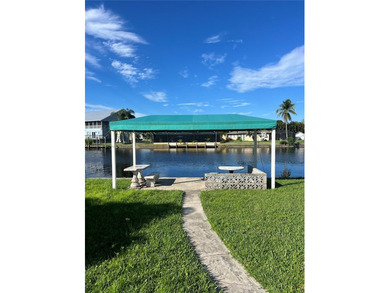Caloosahatchee Riverfront gulf access property ready for a new