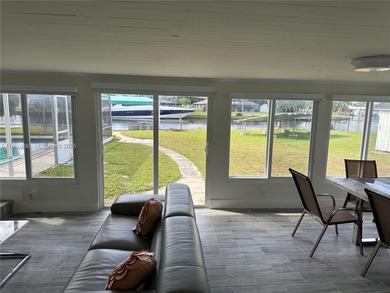 Caloosahatchee Riverfront gulf access property ready for a new