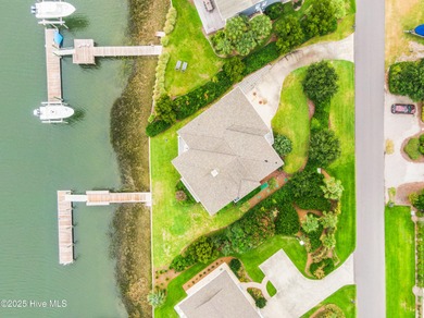 Sweeping views and golden marsh sunsets from this stunning 2014