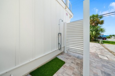 Discover a one-of-a-kind Gulf-front escape where elegance meets