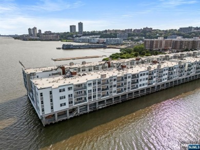 Experience the ultimate in waterfront living in this stunning