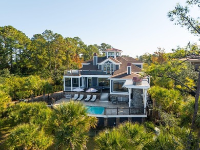Experience the very best of Charleston waterfront living in this