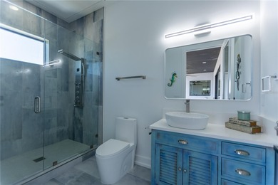 NEW CONSTRUCTION WATERFRONT ESTATE WITH OPEN BAY ACCESS NEAR