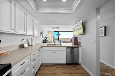 Step into this beautifully refreshed beachside condo where open