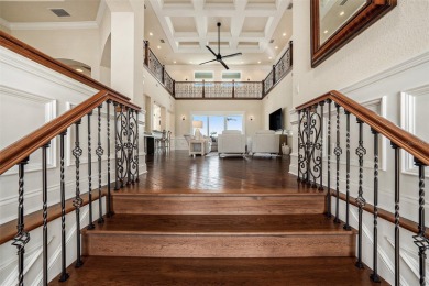 This elegant Spanish Mediterranean residence captures the heart