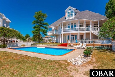 Spacious soundfront home located on iconic Bay Drive. Aptly