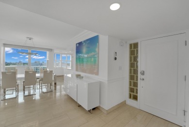 This meticulously renovated 3/2.1 penthouse offers breathtaking