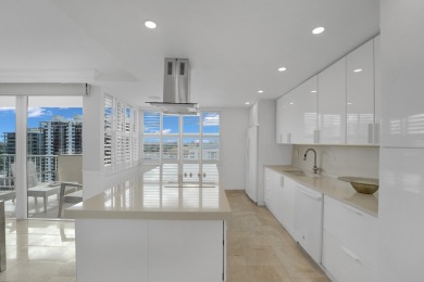This meticulously renovated 3/2.1 penthouse offers breathtaking