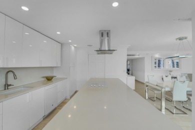 This meticulously renovated 3/2.1 penthouse offers breathtaking