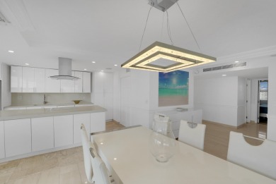 This meticulously renovated 3/2.1 penthouse offers breathtaking