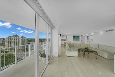 This meticulously renovated 3/2.1 penthouse offers breathtaking