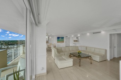 This meticulously renovated 3/2.1 penthouse offers breathtaking