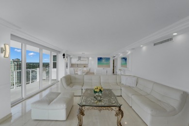 This meticulously renovated 3/2.1 penthouse offers breathtaking