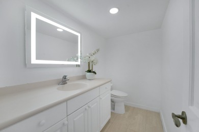 This meticulously renovated 3/2.1 penthouse offers breathtaking