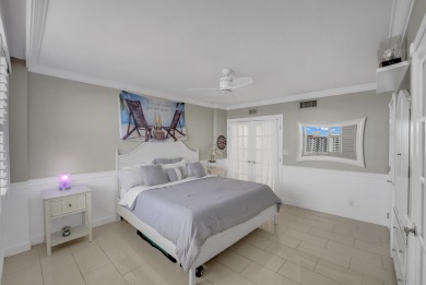 This meticulously renovated 3/2.1 penthouse offers breathtaking