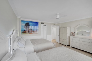 This meticulously renovated 3/2.1 penthouse offers breathtaking