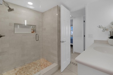 This meticulously renovated 3/2.1 penthouse offers breathtaking