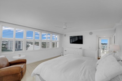 This meticulously renovated 3/2.1 penthouse offers breathtaking