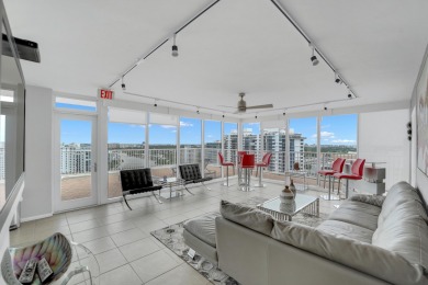 This meticulously renovated 3/2.1 penthouse offers breathtaking
