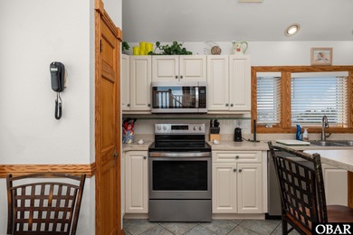 This oceanfront home offers panoramic water views and direct