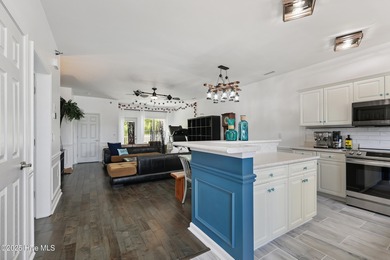 Welcome to this beautifully updated top-floor 2-bedroom, 2-bath