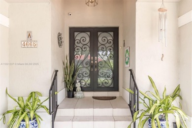 A Home of Distinction! This custom-designed Mediterranean style