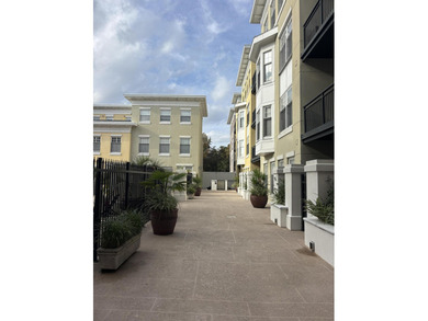 Top Floor end unit with balcony located close to downtown and