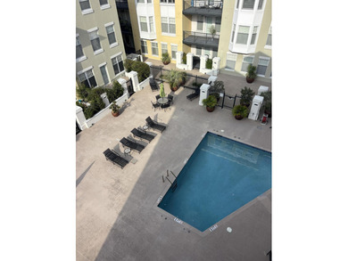 Top Floor end unit with balcony located close to downtown and