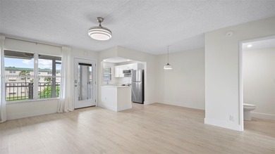 Remodeled 1-Bedroom Condo with Pool and Garden Views

