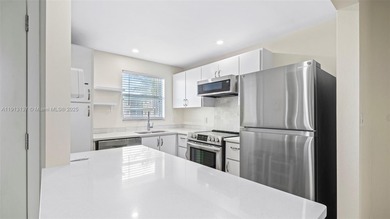 Remodeled 1-Bedroom Condo with Pool and Garden Views

