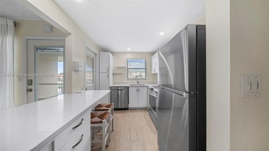 Remodeled 1-Bedroom Condo with Pool and Garden Views

