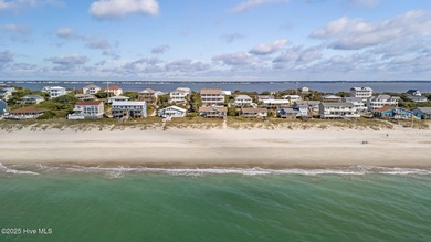 Perched on an elevated lot, this beautiful second-row home