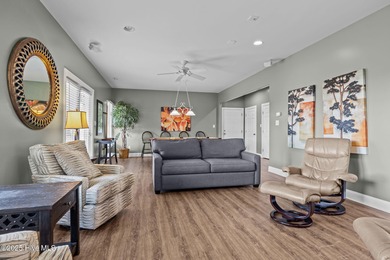 Perched on an elevated lot, this beautiful second-row home