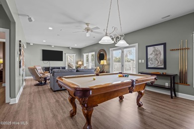 Perched on an elevated lot, this beautiful second-row home