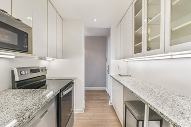 Experience refined city living in this rare A-tier 2 bed / 2