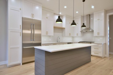 Elevated Luxury at its finest in downtown Elmhurst. These grand