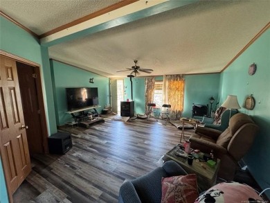 Welcome to 34 Bokchito in Canadian! This 4-bedroom, 2 bath home