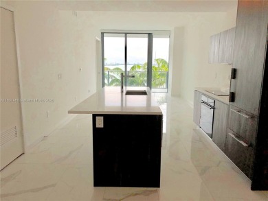 Spectacular 2 bed, 3 bath plus den bayfront unit at Gran Paraiso