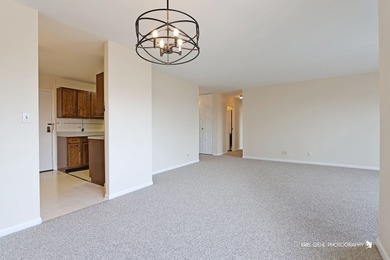Why rent when you can own? Move-in ready 5th-floor condo in
