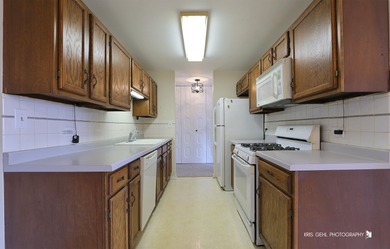 Why rent when you can own? Move-in ready 5th-floor condo in